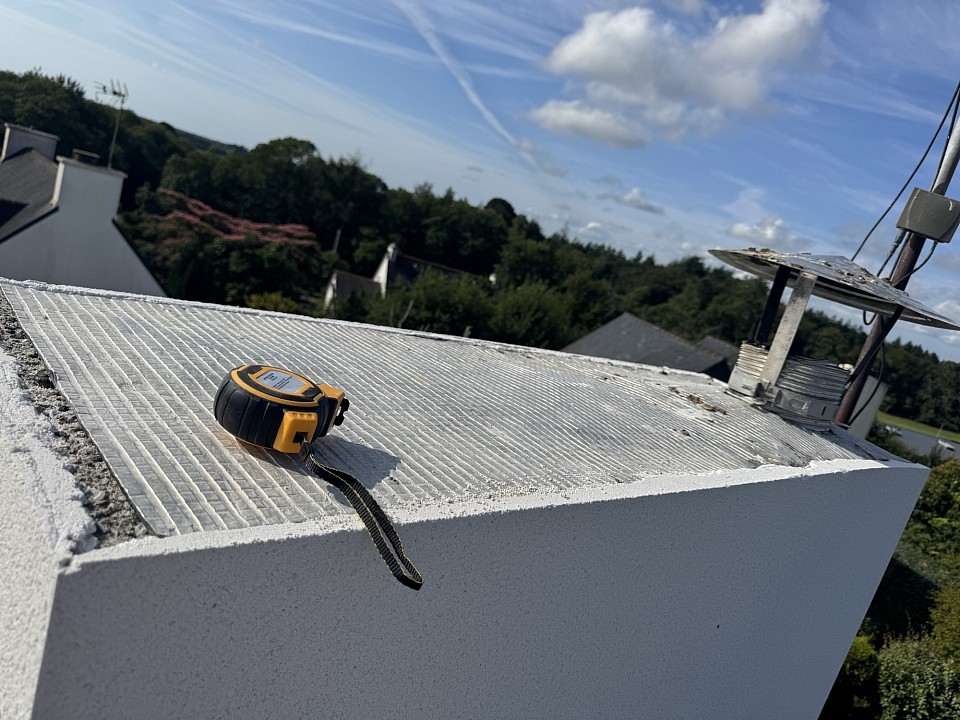 Pose de couverte tête de Cheminee